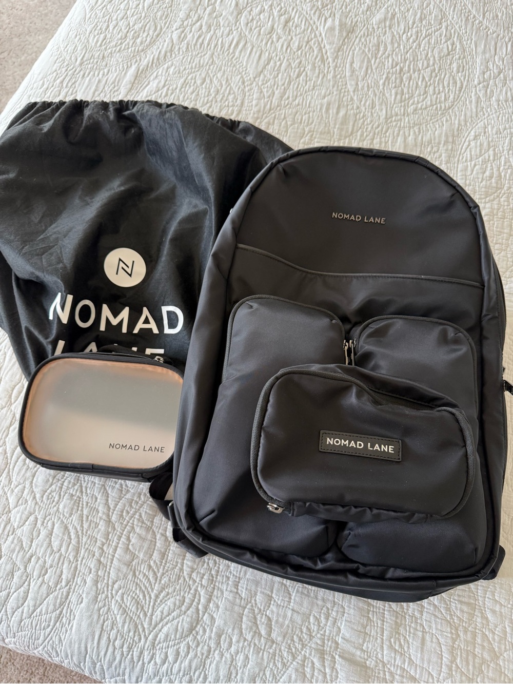 Nomad Black Backpack with Front Pouches